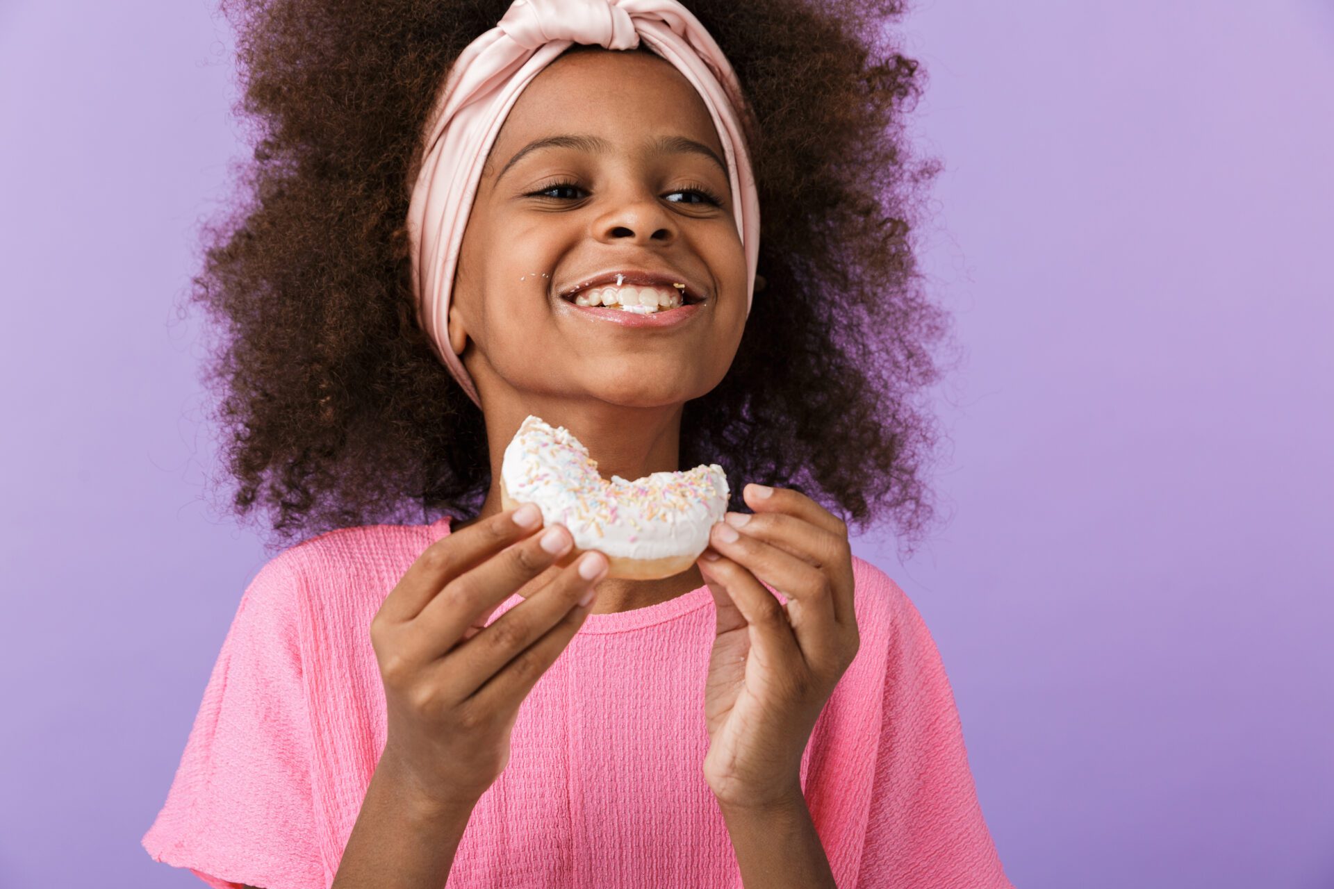 Girl Enjoying Doughnut
